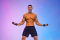 Happy man athlete with dumbbell on pink background. Gym full body workout. Muscular man athlete in fitness gym have havy