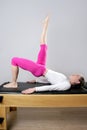 Gym pilates woman reformer yoga leg sport