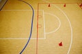 Gym for playing futsal, mini-football. Folded wooden parquet on the field of hall for mini-football. Futsal ball and bright line Royalty Free Stock Photo