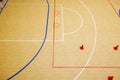 Gym for playing futsal, mini-football. Folded wooden parquet on the field of hall for mini-football. Futsal ball and bright line Royalty Free Stock Photo