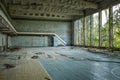 Gym in recreation center `Energetik` `Energy` in abandoned town Pripyat. Inscription in Russ