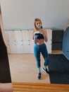 Woman taking selfie in the gym