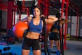 Gym woman with weighted ball and rope Royalty Free Stock Photo