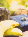 Gym workout accessory close up banana and soft focus earphones o
