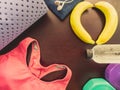 gym workout accessory from pink sportswear , yoga mat and refresh energy by banana and relax by listen music with earphones with