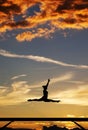 Gymnast on balance beam Royalty Free Stock Photo