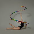 Gymnast with a ribbon  deflection back Royalty Free Stock Photo