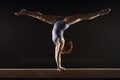 Gymnast Doing Split Handstand On Balance Beam Royalty Free Stock Photo