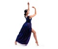 Gymnast in a dress performs a grace pose of rhythmic gymnastics on a white background