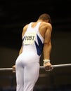 Gymnast on high bars Royalty Free Stock Photo