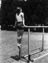 Gymnast on parallel bars outside Royalty Free Stock Photo