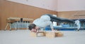 Gymnast performing planche push ups and handstand at gym