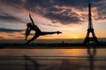 Gymnast stretching at sunset by the Eiffel Tower Royalty Free Stock Photo