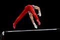 Gymnast on uneven bars Royalty Free Stock Photo