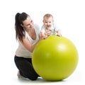 Gymnastics for baby with fitness ball Royalty Free Stock Photo