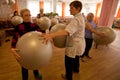 Gymnastics with ball for eldery Royalty Free Stock Photo