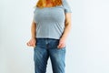 Gynecologic problems, urinary incontinence, female health. Woman showing off wet jeans Royalty Free Stock Photo