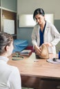 Gynecological doctor teaching breast self-examination Royalty Free Stock Photo