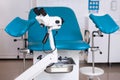 Gynecological room gynecologist chair equipment doctor female lens microscope optics Royalty Free Stock Photo