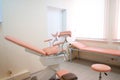 Gynecological room in hospital. Gynecological chair with a couch