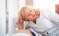 A gynecologist examines a pregnant woman. Fetal heart auscultation.