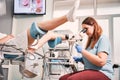 Gynecologist examining female patient with colposcope. Royalty Free Stock Photo