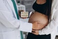 Gynecology consultation. Pregnant woman with her doctor in clinic