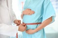 Gynecology consultation. Pregnant woman with her doctor
