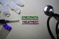 Gynecomastia Treatment text on Sticky Notes. Top view isolated on office desk. Healthcare/Medical concept