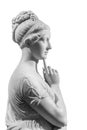 Gypsum copy of ancient statue of thinking young lady isolated on white background. Side view of plaster sculpture woman Royalty Free Stock Photo