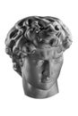 Gypsum copy of head statue David for artists. Copy of face famous sculpture youth of David focused on upcoming fight Royalty Free Stock Photo
