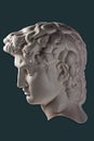 Gypsum copy of head statue David for artists. Copy of face famous sculpture youth of David focused on upcoming fight Royalty Free Stock Photo