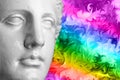 Gypsum head antique sculpture on a colorful retro vaporwave background. Contemporary art collage.