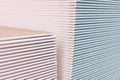 Gypsum plasterboard in the pack. The stack of gypsum board preparing for construction. Pallet with plasterboard in the building Royalty Free Stock Photo