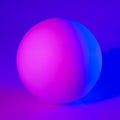 Gypsum sphere in pink and blue neon light