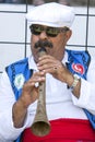 A gypsy flute player performs at the Kirkpinar Turkish Oil Wrestling Festival in Edirne in Turkey.