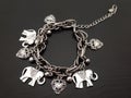 Elephant and heart charms bracelet ethnic boho gypsy style silver color bijou Royalty Free Stock Photo