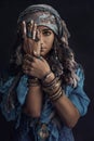 Gypsy style young woman wearing tribal jewellery portrait Royalty Free Stock Photo