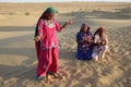 Gypsy women dancing and singing in the Desert, Rajasthan, India
