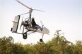 Gyrocopter in flight Royalty Free Stock Photo