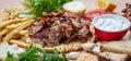 Gyros pita, Shawarma. Traditional greek, turkish meat food on pita bread and tzatziki, banner Royalty Free Stock Photo