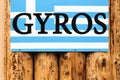 Gyros sign on a wall Royalty Free Stock Photo