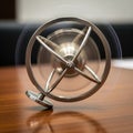 Gyroscope spins on a wooden surface, showcasing a circular frame with intersec Royalty Free Stock Photo