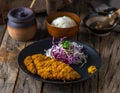 GYU HIRE katsudon with white rice and salad served in a dish isolated on wooden background side view of japanese food Royalty Free Stock Photo
