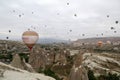 View from the observation deck of the village of GÃÂ¶reme on the flight of balloons over the valleys