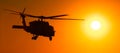 H-60 helicopter at sunset