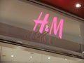 H&M storefront. Hennes and Mauritz, better known as H&M, is a Swedish ready-to-wear company and chain of stores for women, childre