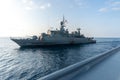 H.T.M.S. Rattanakosin, corvette of Thai navy sails along the other ship to prepare replenishment at sea between annaul exercise in Royalty Free Stock Photo