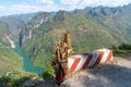 Ha Giang mountain view at Ma Pi Leng pass with children carry wood on back heading home on road Royalty Free Stock Photo