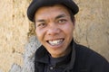 Ha Giang, Vietnam - Feb 7, 2014: Portrait of a Hmong man smiling at tourist. The Hmong are an Asian ethnic group from the mountain